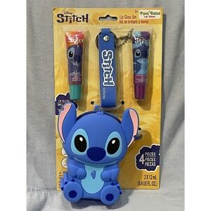 NEW Walt Disney Stitch 4 Piece Lip Gloss Keychain & Stitch Silicone Bag Set